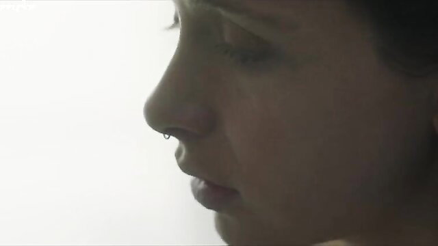 Kathi Wolf profile closeup sexy lips piercing softcore celeb nude tease