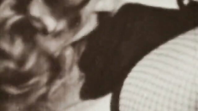 Vintage lesbian porn thumbnail, two women in lingerie embracing intimately
