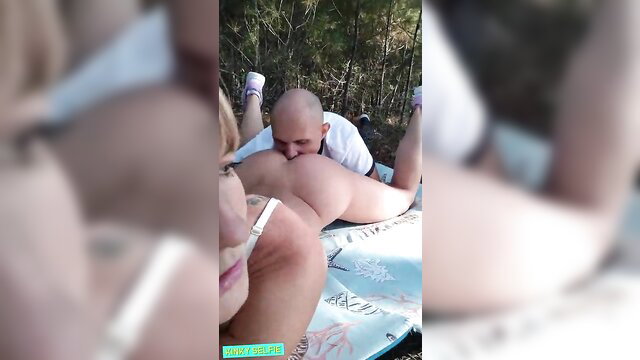 Sasha Bikeyeva teen pussy licked outdoors by bald guy on blanket