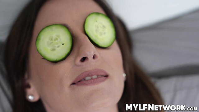 Ally Cooper with cucumber slices on eyes relaxing, pretty MILF