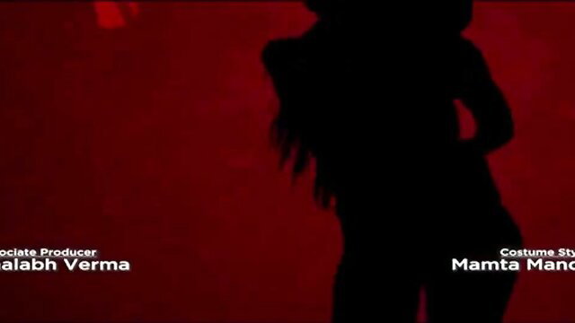 Silhouette of curvy Indian woman in sexy costume, red background ALTBalaji