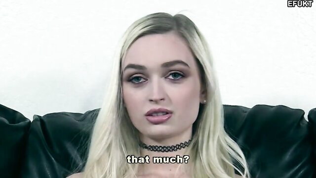 Blonde babe in choker on couch, shocked 'that much?' expression