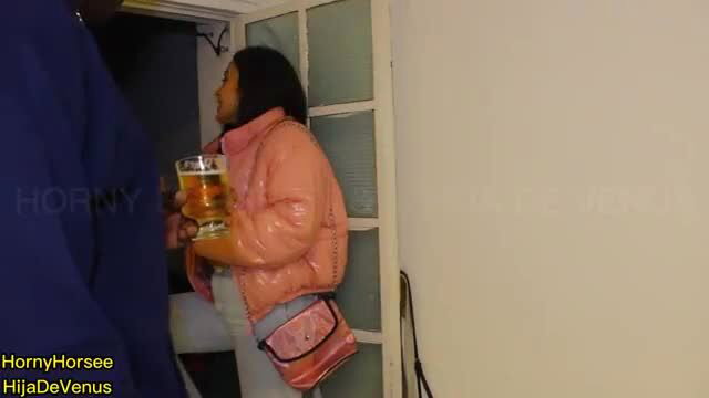 Kate Dalia in pink puffer jacket holding beer at door, hot Latina teen