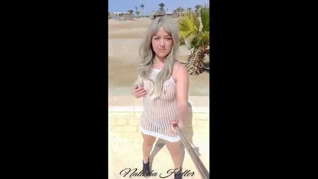 Blonde in sheer see-through dress no underwear outdoors