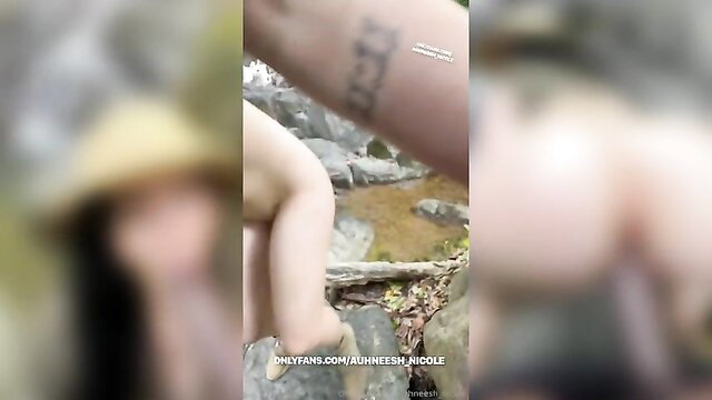 Hot babe tattoo arm outdoor BBC tease by stream rocks