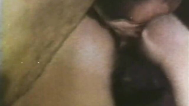 Vintage porn closeup: woman with natural tits in doggystyle, curly hair