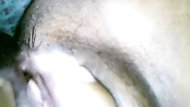 Dark-skinned Mally films closeup pussy lips in dark amateur hidden cam