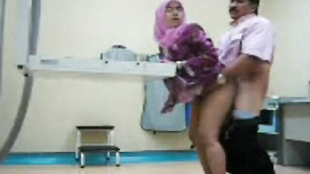 Malay hijab wife fucked by husband on office table