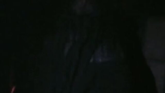 Vintage 1972 softcore confession: nude brunette kneels in dim light