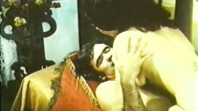Vintage Josefine Mutzenbacher couple sex scene with long-haired brunette on man