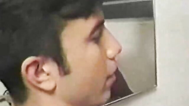 Closeup of young Arab man's profile face in vintage gay interracial sex thumbnail