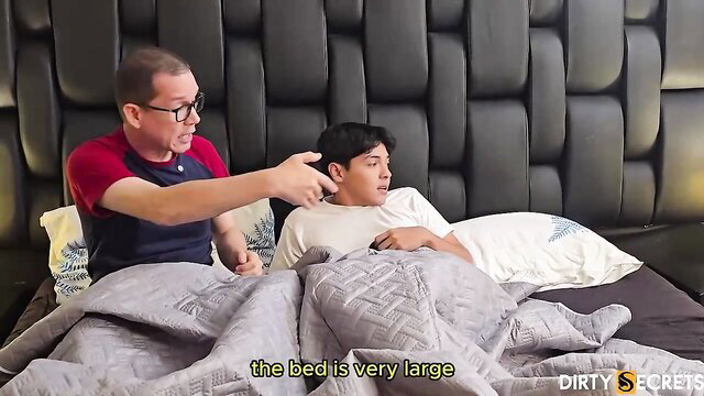 LilTimy Asian twink in bed with older man touching hair, gay intimate scene