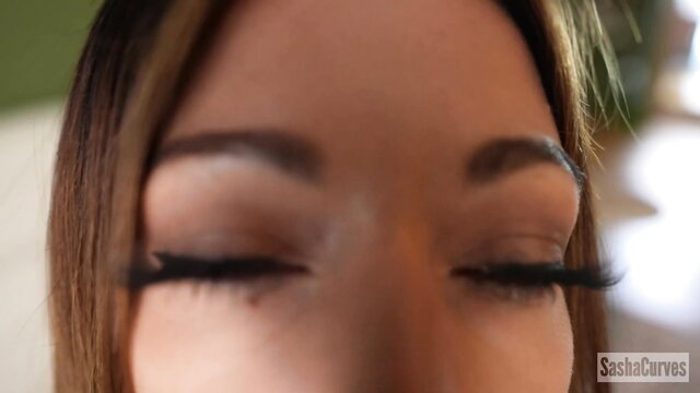 SashaCurves closeup eyes, seductive gaze in MommyBot video
