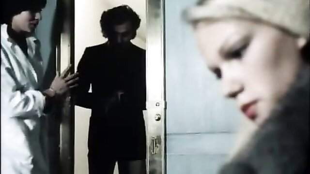 Vintage Frauenarzt scene: Asian nurse, suited man at door, blonde woman closeup