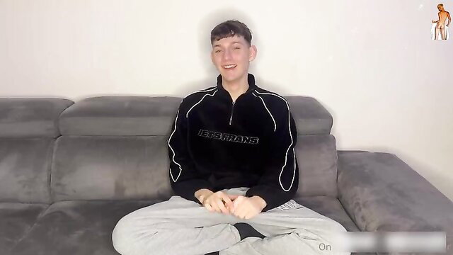 Sexy gay twink cutie in track pants on casting couch amateur
