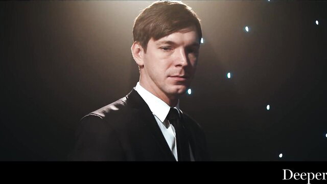 Markus Dupree in suit on spotlight stage, Deeper porn thumbnail