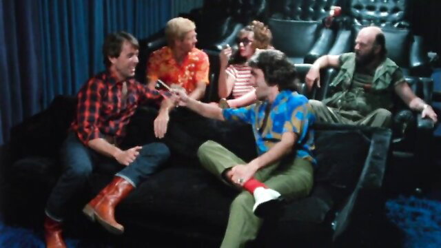 Naughty Network 1981 vintage porn group in theater seats