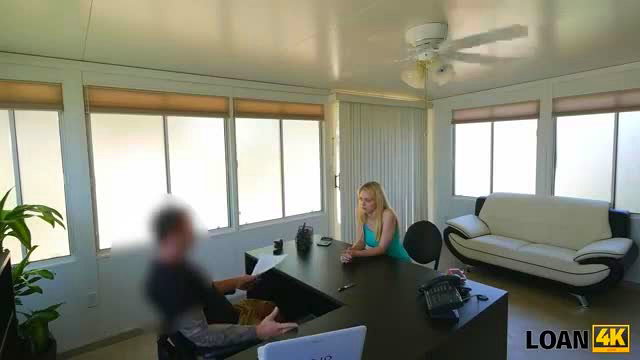Allie Rae blonde teen in tight dress at desk in Loan4K scene