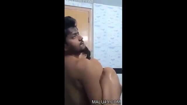 Indian wifey in steamy bathroom embrace, putting rubber on hubby's cock