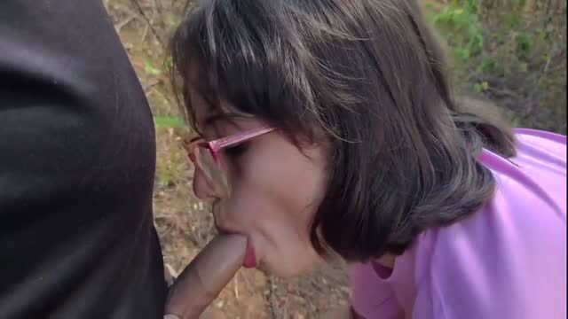 Jasmine with glasses sucking cock outdoors in woods