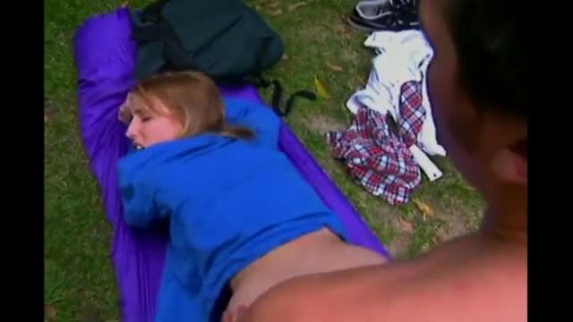 Blonde teen in blue hoodie gets fucked outdoors on purple sleeping bag