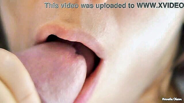 Veronika Charm's big lips and tongue up close in blowjob