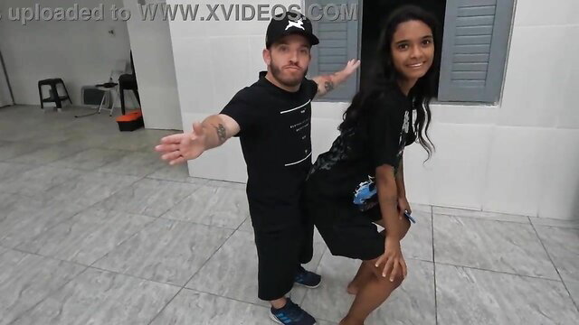 Jasmine poses with midget in tight clothes, seduction tease