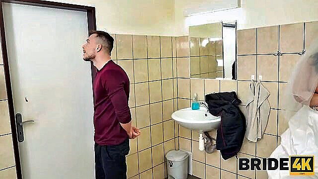 Sofia Lee in bathroom with busty bride in hazmat suit, cheating scene