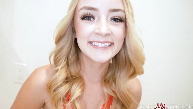 Maria Kazi smiling blonde in red lingerie, hotwife thumbnail