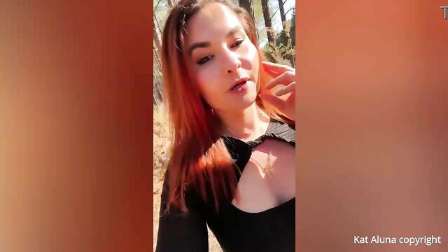 Kat Aluna teases cleavage in black cutout top outdoors