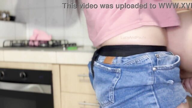 Asian teen in tiny denim shorts bends over kitchen counter, big ass tease