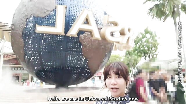 Asian woman vlogging at Universal Studios Singapore, JAV travel amateur
