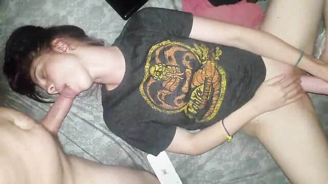 Amateur girl in Cobra Kai tee gets facefucked by guy on bed