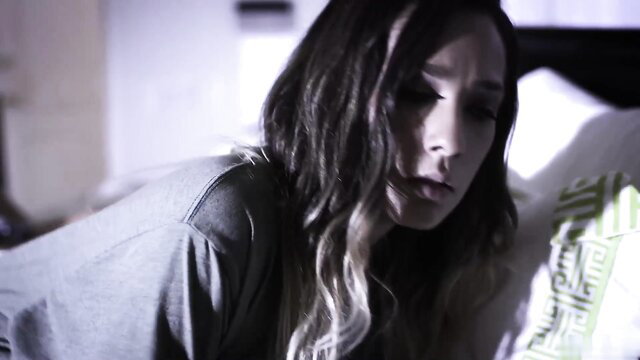 Jaye Summers in bed, sultry gaze, Bad Uncle scene