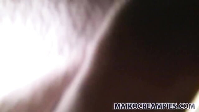 Blurry closeup of pale skin and curves in steamy creampie scene