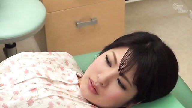 Asian woman asleep on medical bed in JAV creampie doctor fetish scene
