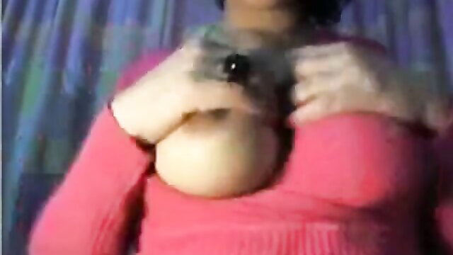 MILF with huge bare breasts exposing massive pale tits and nipples