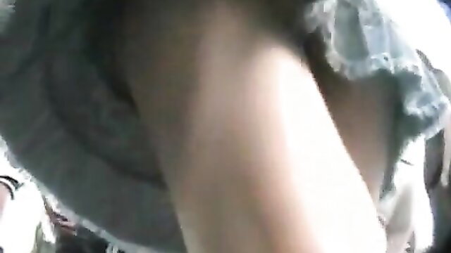 Wind-blown upskirt revealing sexy thong ass