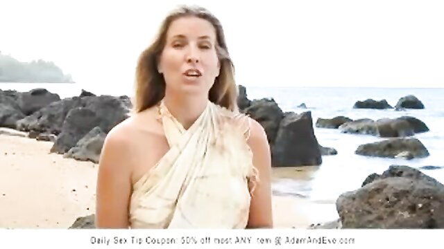 Blonde woman in beach sarong shares sexual hygiene tips