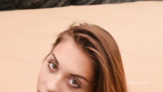 Sabrisse Aaliyah closeup portrait in desert, seductive eyes and brown hair