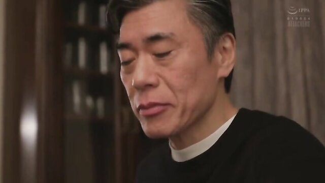 Asian priest in clerical collar closeup, intense gaze from JAV taboo video