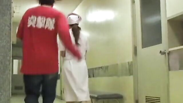 Red shirt guy sharking teen Japanese nurse in hospital hallway