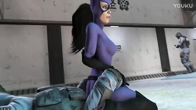 Catwoman in shiny purple catsuit straddles soldier in sexy wrestling scene