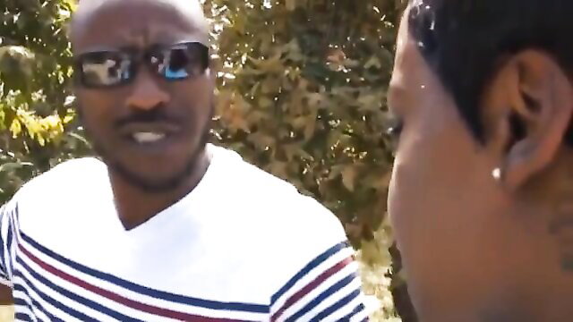 Layla Monroe thick ebony in sunglasses talks outdoors in sexy striped shirt