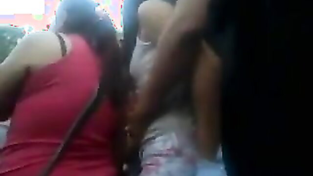 Crowded public grope of two latina women in tight dresses from behind