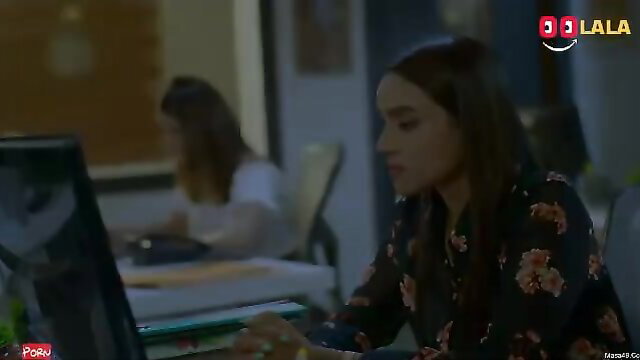 Two sexy Indian office girls in floral tops at desks