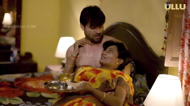 Indian MILF in saree fed by man on bed in Charmsukh Bidaai