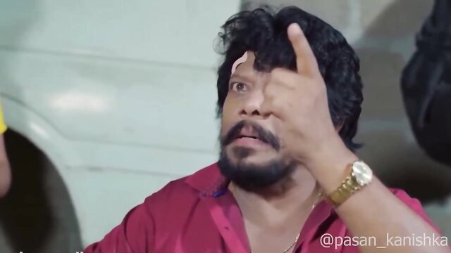 Sinhala man with hand on face in intense BDSM teledrama thumbnail