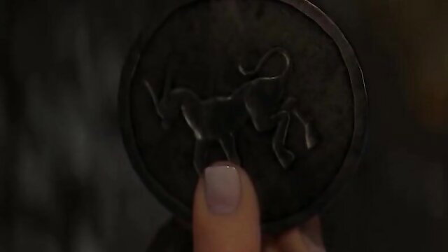 Island of Sacred Beasts hentai closeup of dark horse emblem coin held by pink nail finger