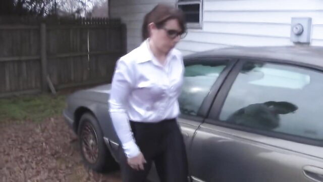Sarhye bound in car, white blouse black pants BDSM outdoor tease